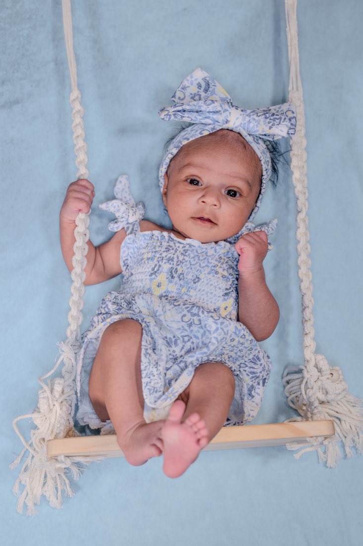 A newborn photographed in studio